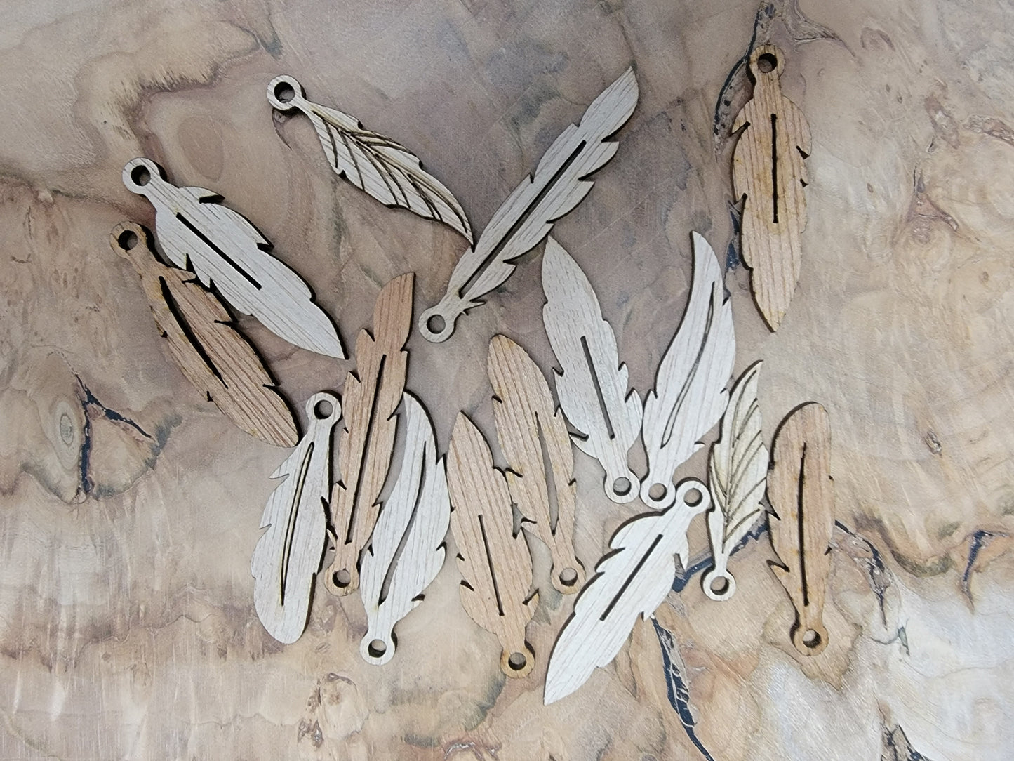 15 wooden feathers with eye hole craft supplies